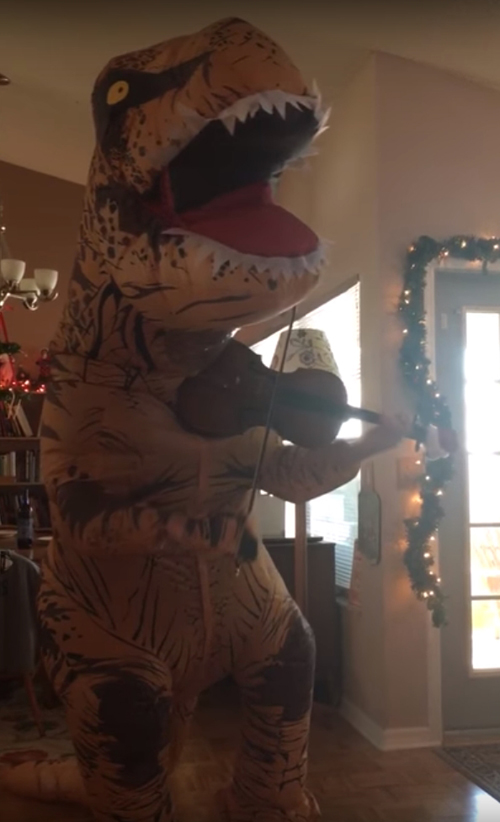 динозавр играет на скрипке