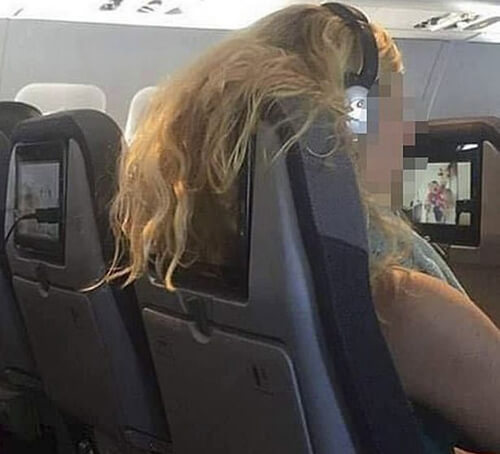 длинные волосы авиапассажирки