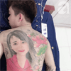 татуировка с портретом на спине