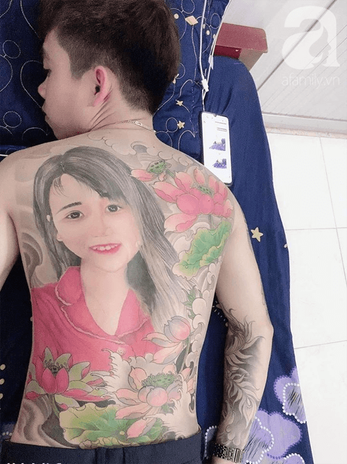 татуировка с портретом на спине