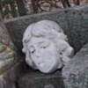 голова кладбищенской статуи