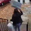 woman helped take out the trash