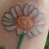 татуировка в виде цветка