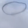 strange black ring in the sky