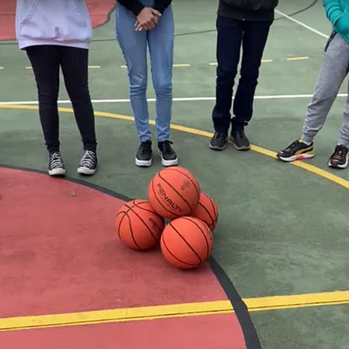 rolling basketballs