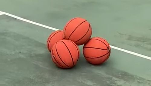 rolling basketballs