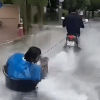 катание в корыте по улице
